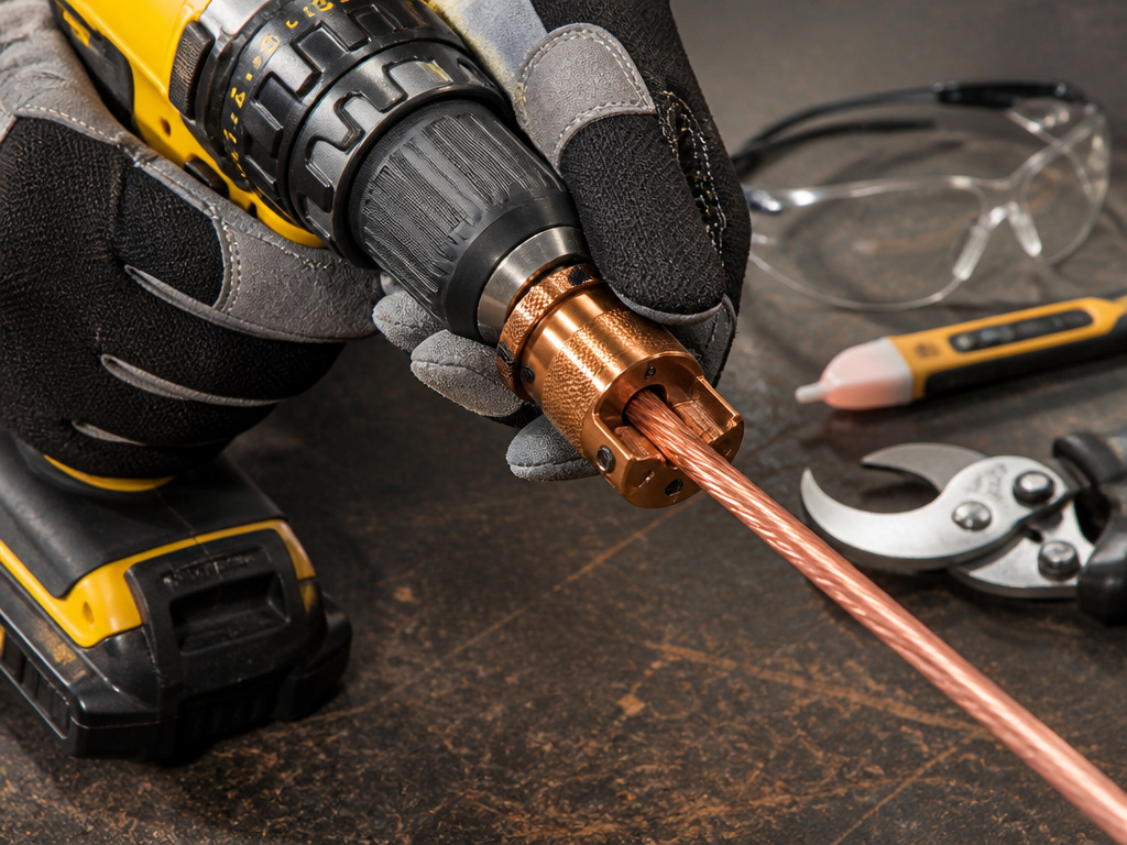 Essential tools for stripping copper wire safely with a power drill.